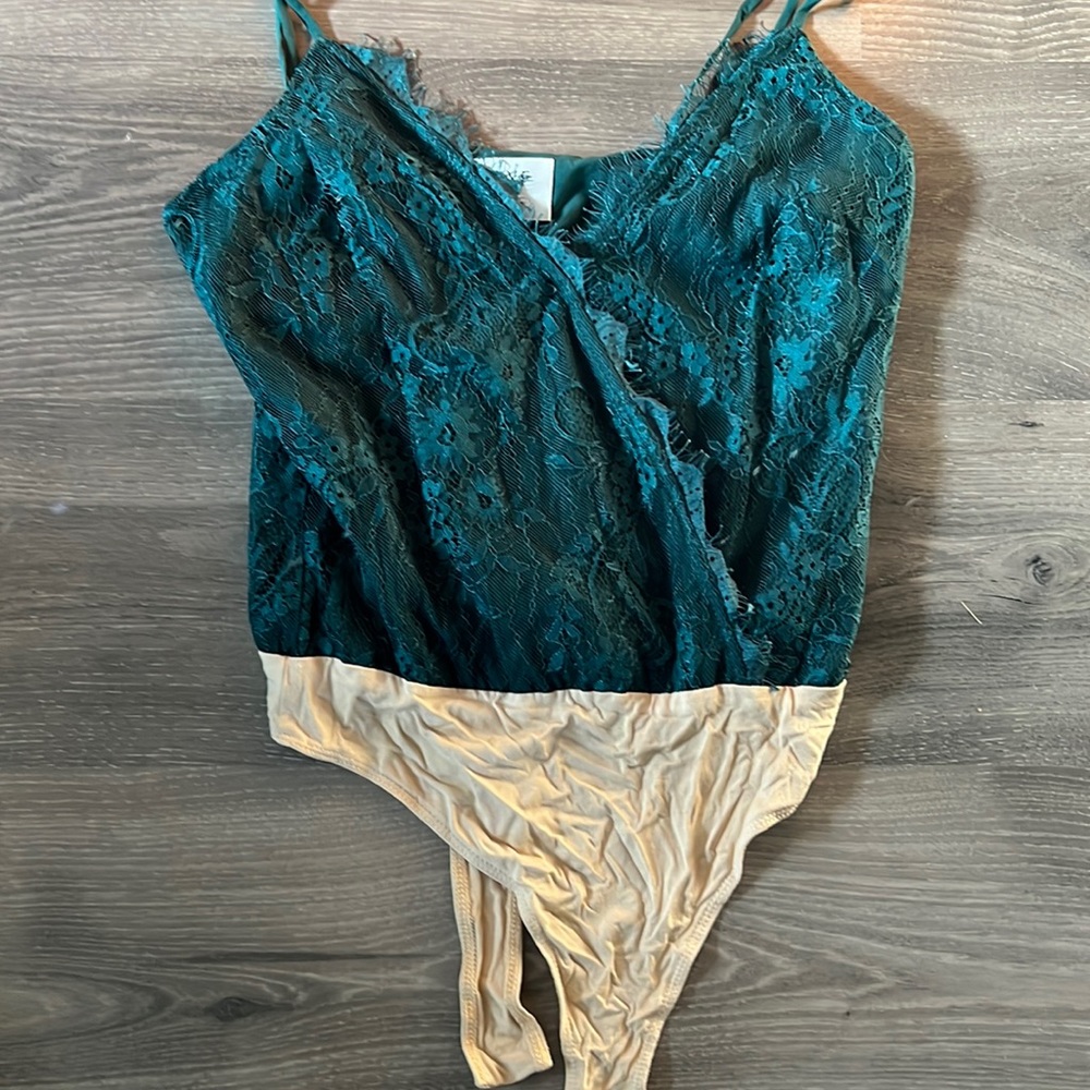 Green lace body suit